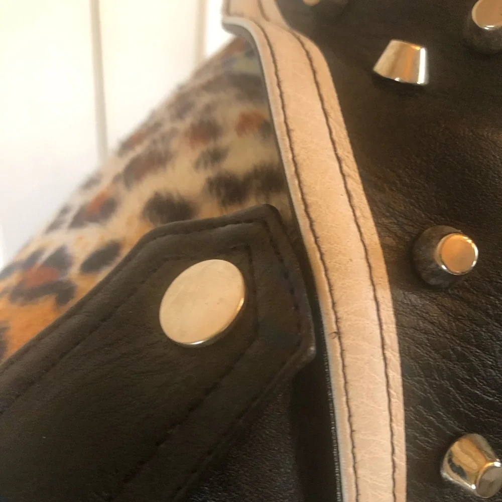 Studded Black Vegan Leather Jacket with White Graphic Patches